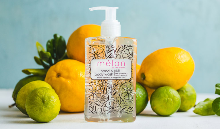 hand and body wash melan skincare bottle with citrus fruits