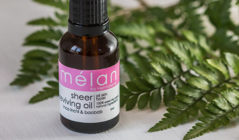 sheer reviving oil melan skincare with leaves